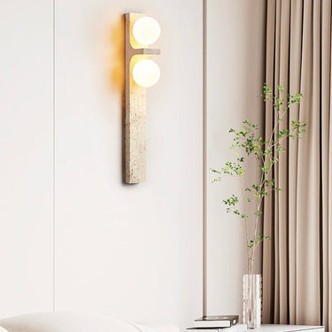 Dual globe travertine wall lamp detail